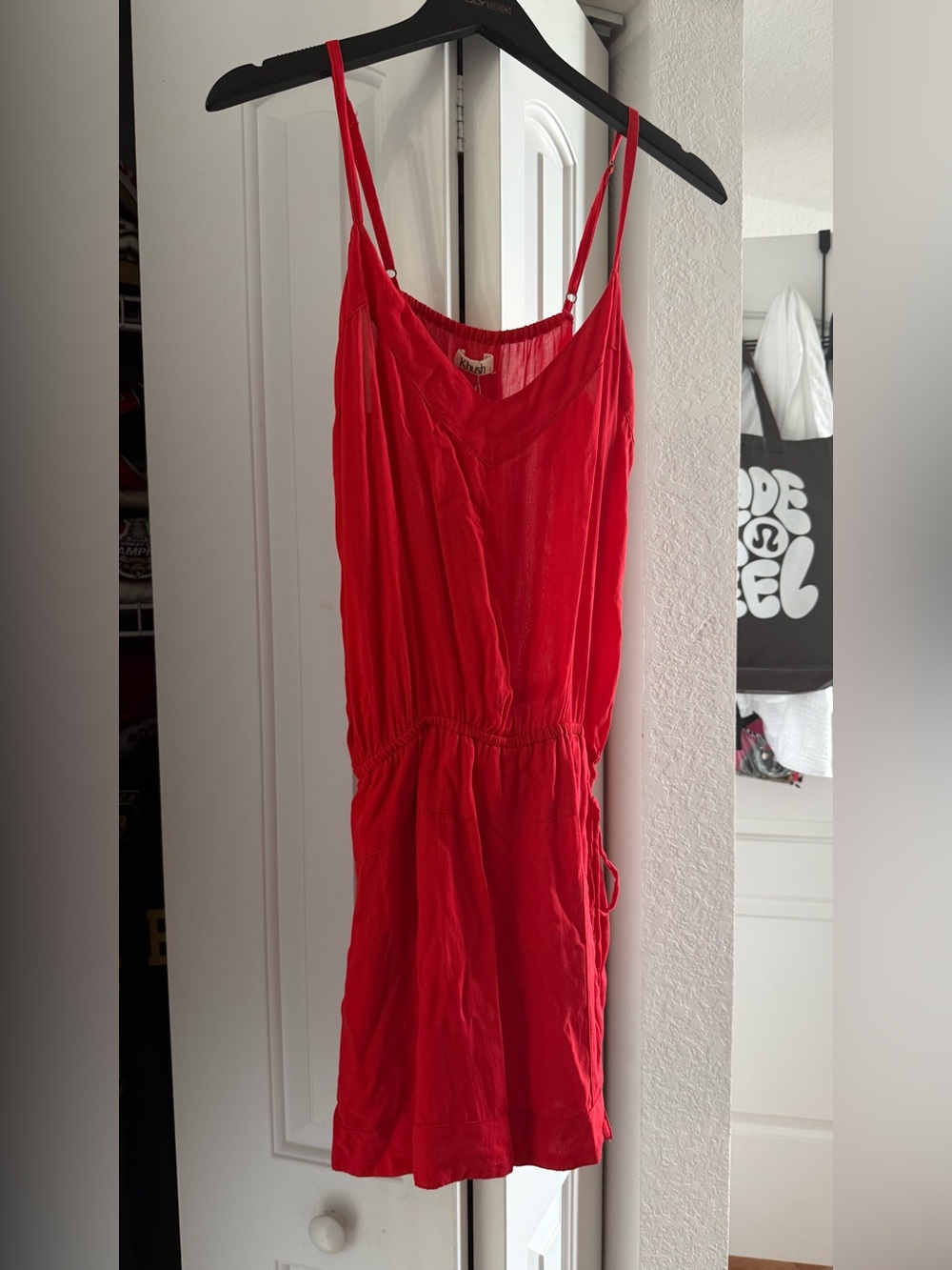 Red Sleeveless Drawstring Waist Romper - Size Large. Brand new with Tag. .